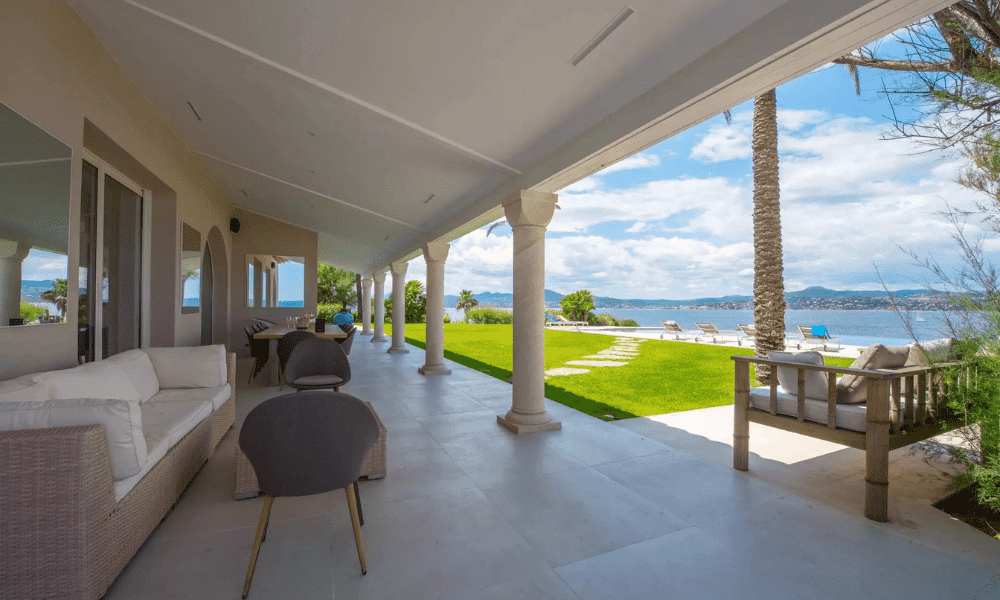 Terrace dining setup overlooking coastal horizon